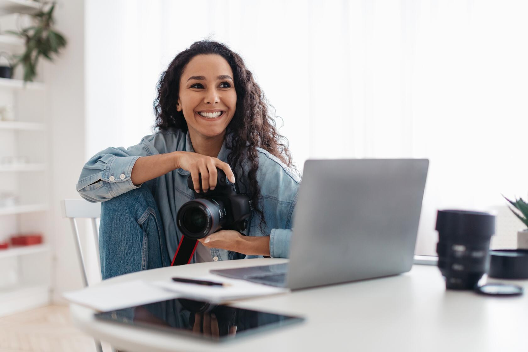 a photographer with a laptop